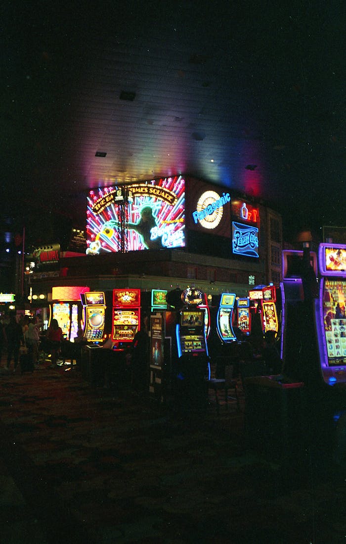 why-choose-us Vibrant Las Vegas casino scene filled with colorful neon lights and slot machines at night.
